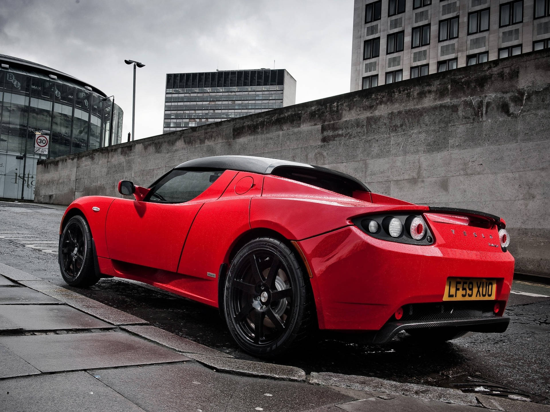 Breathtaking Tesla Roadster Rear Side View Wallpaper