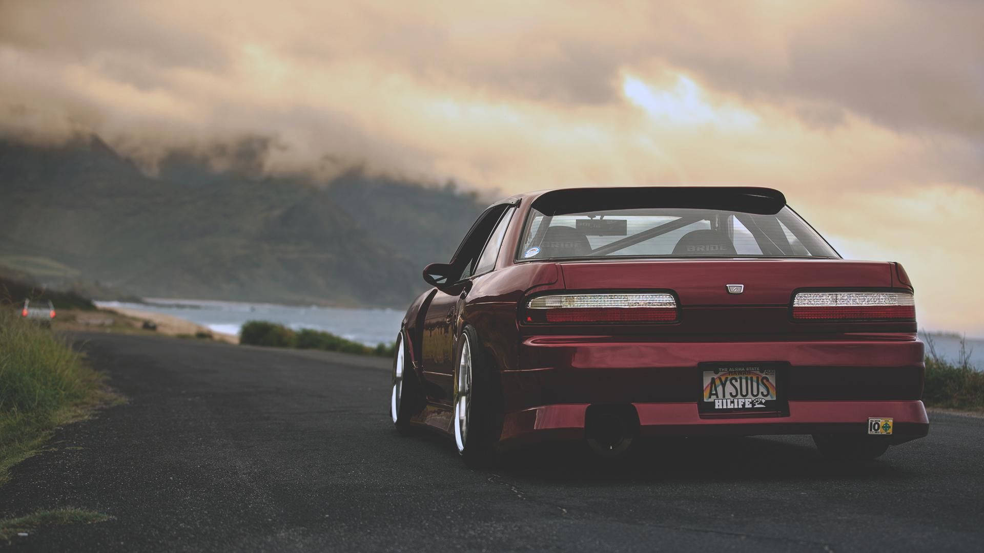 Epic Red Jdm Nissan Silvia S14 Ocean Road Background Image