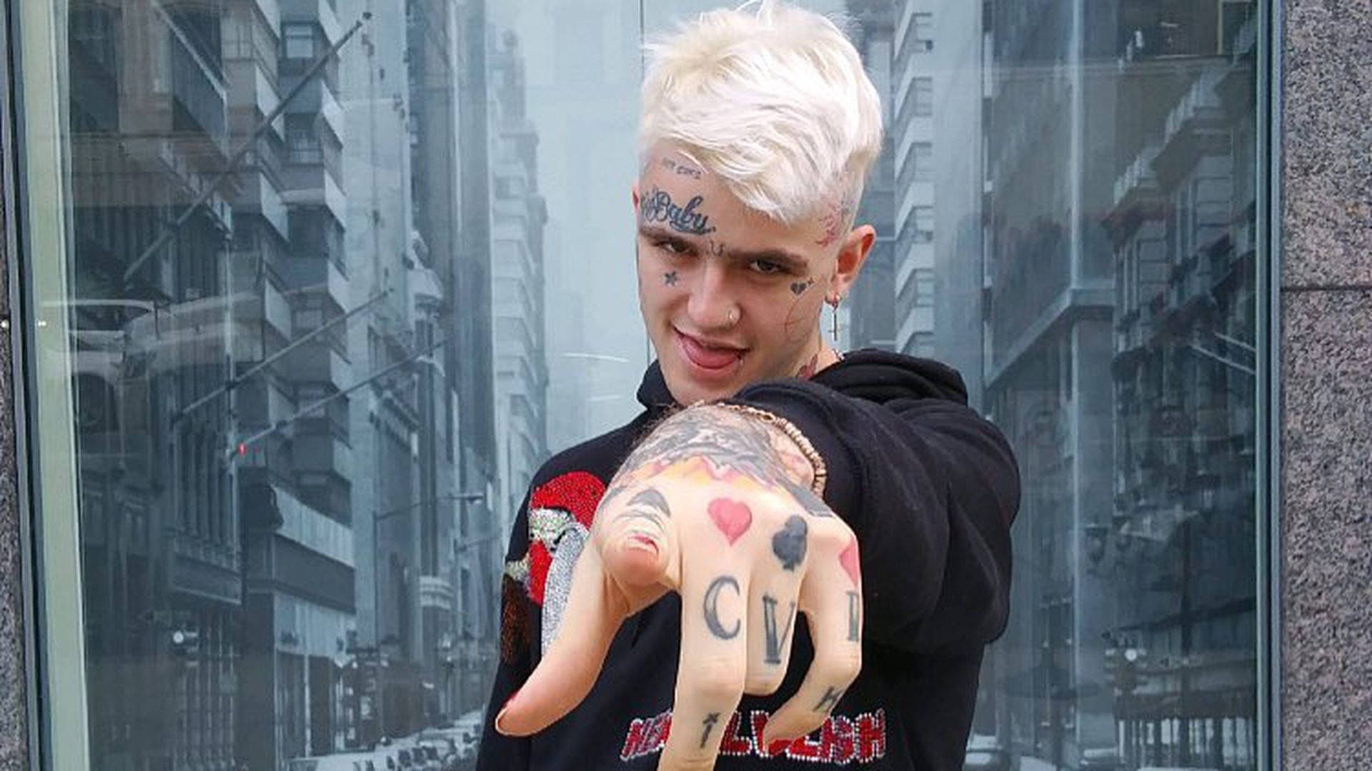 Vibrant Lil Peep gazing off into the distance. HD Wallpaper